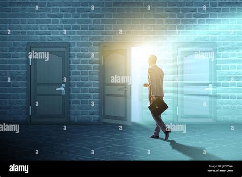 Businessman Walking Towards Open Door Stock Photo Alamy