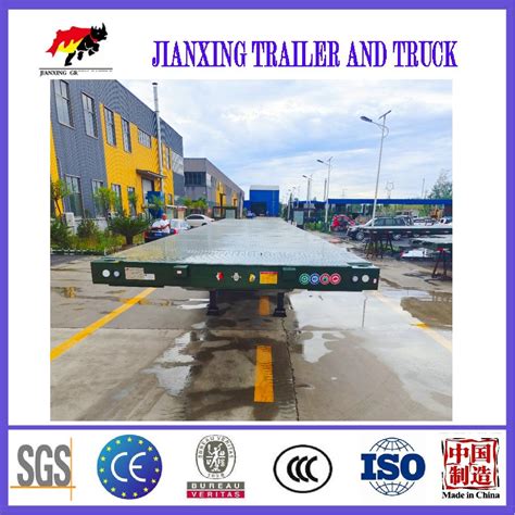 Factory Direct Sale Tri Axle 40 FT Flatbed Container Semi Trailer For