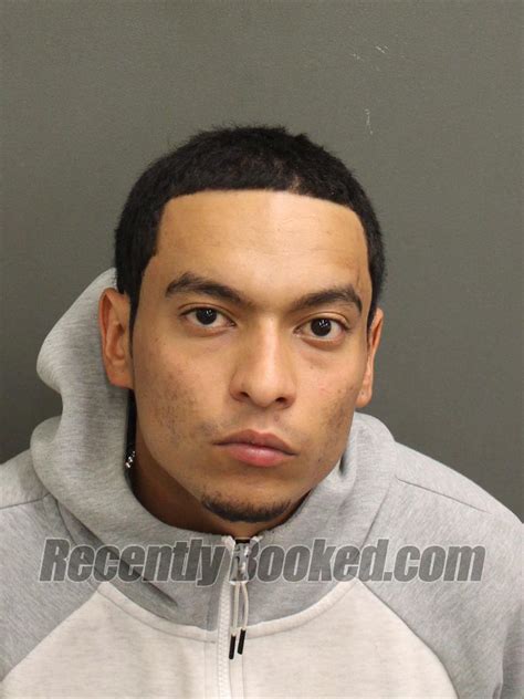 Recent Booking Mugshot For Angel Raymond Perez In Orange County Florida