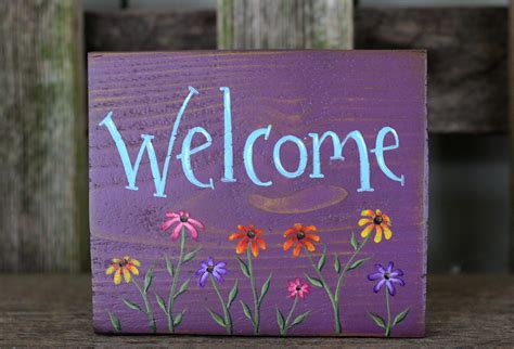 Welcome Sign with Flowers