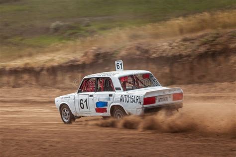 Rally Off-road Car Make a Turn with the Clouds and Splashes of Sand ...