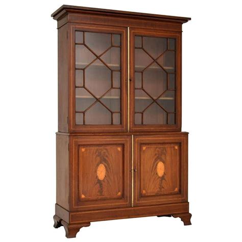 Antique Carved Mahogany Glass Front Double Bookcase at 1stDibs