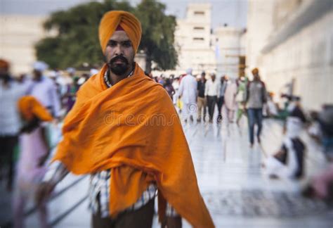 Sikhs And Indian People Visiting The Golden Temple In Amritsar Punjab