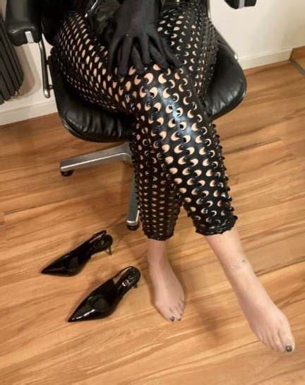 Black Leggings Nylons And High Heel Sling Pumps