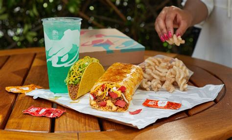 Taco Bell’s New Grilled Cheese Burrito Has Cheese On The Inside And Outside Of The Tortilla