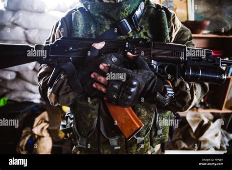 Donetsk, Donbass, Ukraine. 18th Sep, 2016. Soldier holds his AK-47 ...