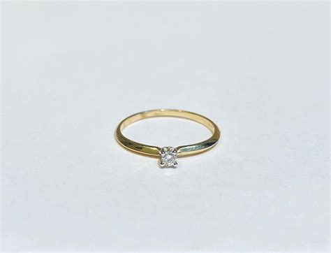 ANILLO COMPROMISO SOLITARIO ORO AMARILLO 14K 0.06 CT. DIAMANTE NATURAL, 3 MSI (TODAS LAS ...