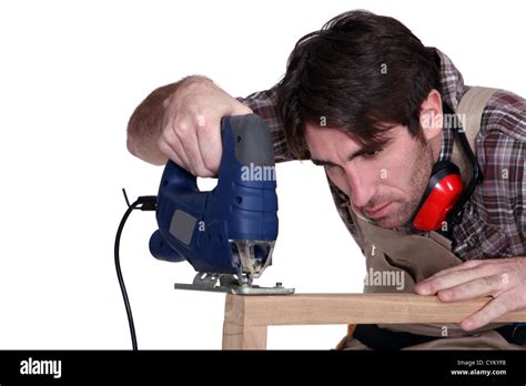 Carpenter Using A Jigsaw Stock Photo Alamy