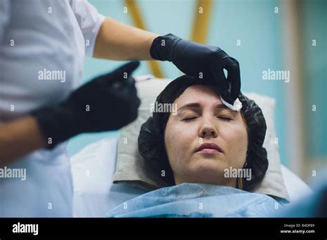 Cosmetologist Doctor Make Facial Beauty Injections To Her Woman Client