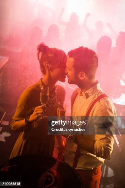 Couple Kissing Nightclub Photos And Premium High Res Pictures Getty