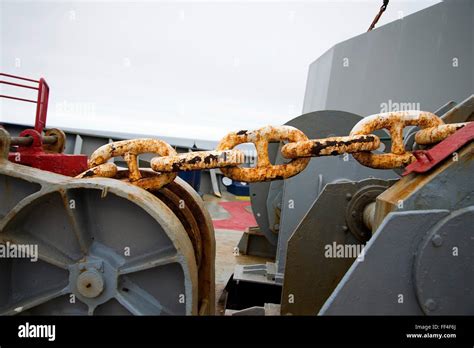 Closeup Of Huge Rusting Anchor Chain On Deck Of Container Ship Corte