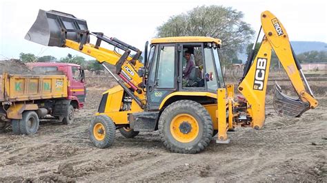 Jcb Backhoe Loading Mud In Dump Truck Village Panchayat Work Tata