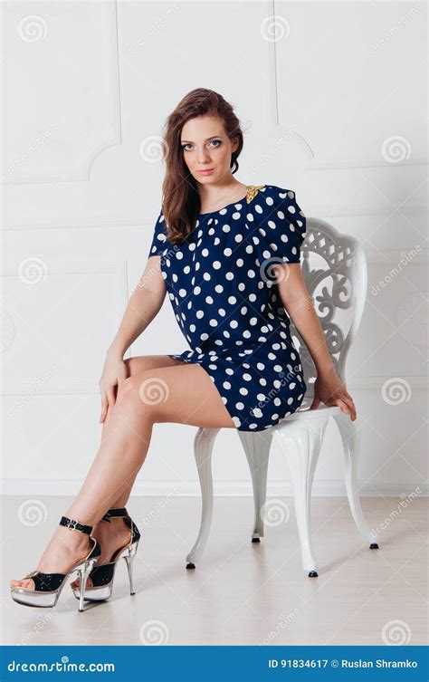 Beautiful Brunette On White Chair Stock Image Image Of Fashion Blue