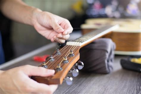 Premium Photo Midsection Of Man Playing Guitar