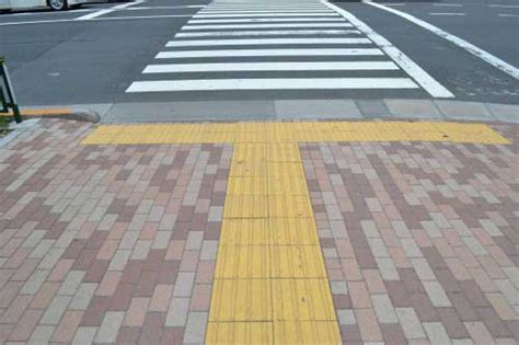 The Actual Purpose Of Those Colorful Sidewalk Bumps Go Viral