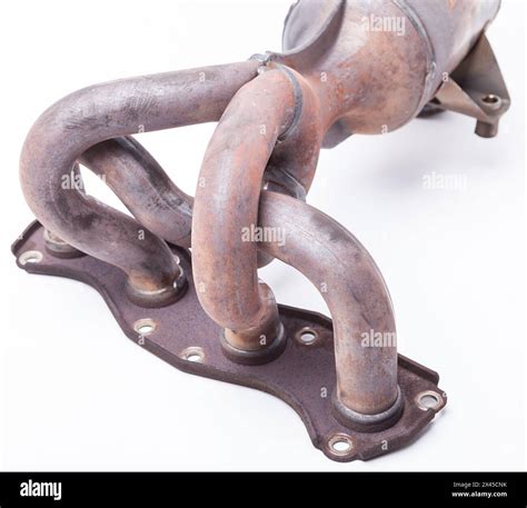 A Automotive Exhaust Manifold With Catalyst Isolated On White Exhaust