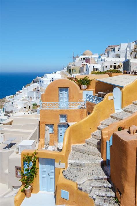 White Churches An Blue Domes By The Ocean Of Oia Santorini Greece