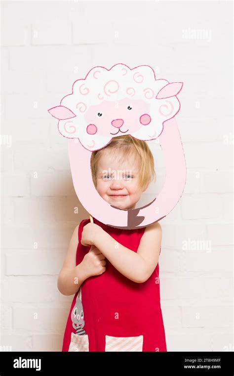 Little Girls Holding Sheep Mask On White Background Stock Photo Alamy