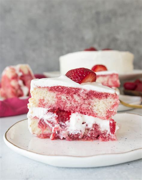 This strawberry shortcake layer cake is packed with strawberries and ...