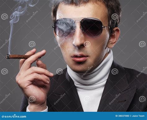 Man Wearing Sunglasses And Smoking A Cigerette Stock Photo Image