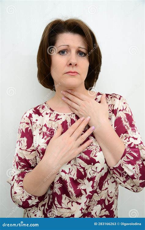 Woman Holds Her Hand On Her Neck Concept Of Diseases Tonsillitis Hyperthyroidism And Others