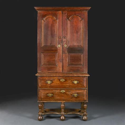 A Fine Mid 18th Century Elm Cabinet On Stand Bada