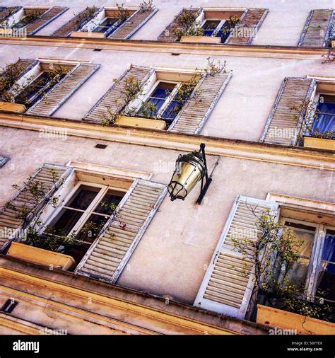 Shuttered Windows On A Parisian House Stock Photo Alamy