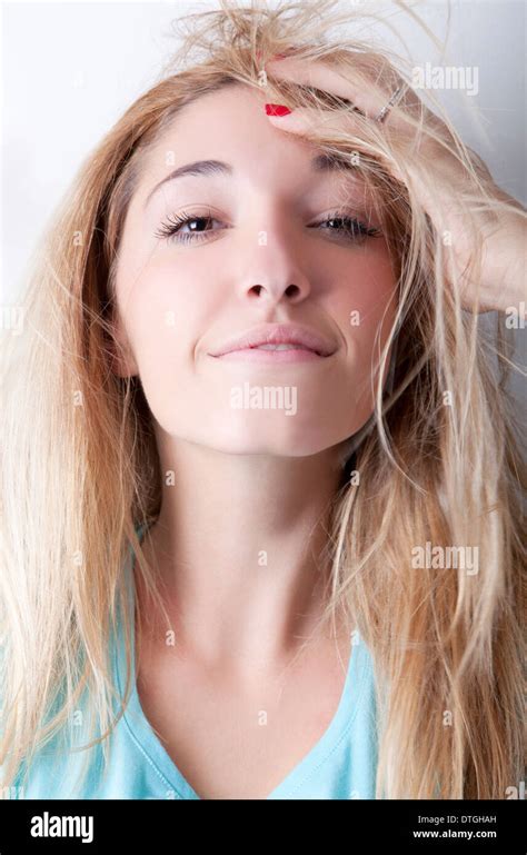 Teenage Girl With Hand On Hair Stock Photo Alamy