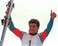 Italian skier Alberto Tomba gives the thumbs up after winning the men's giant slalom 25 February ...