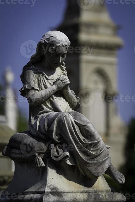 Praying Girl Statue 740212 Stock Photo at Vecteezy