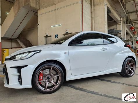 toyota yaris gr white advan rg wheel front