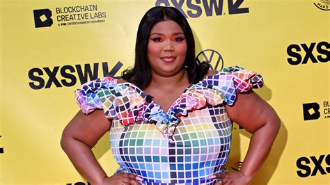 Lizzo S Extra Long Barbie Pink Nails Are Everything — See Videos Allure