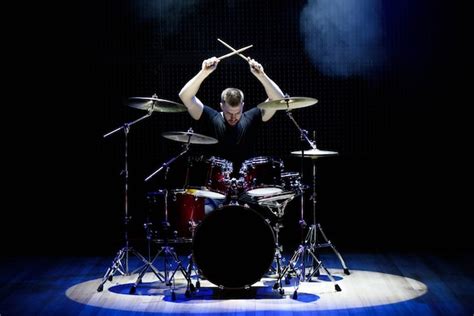 Premium Photo Drummer Playing The Drums On Stage