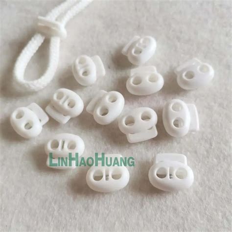 100pcs Lot White POM Plastic Ball Cord Lock Toggles Plastic 2 Hole