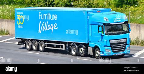 DAF hgv juggernaut lorry truck driver & blue Furniture Village retail ...