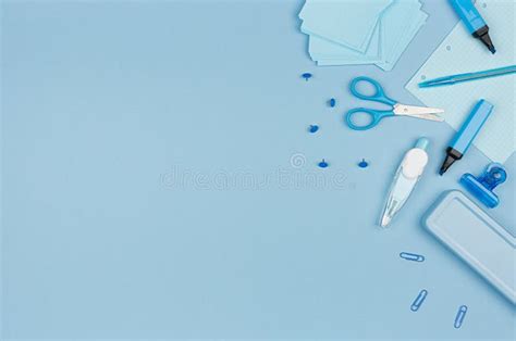 Pastel Blue Color Office Stationery Set On Blue Background Concept Art