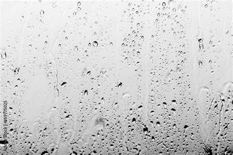 Rain drops on the glass, background Stock Photo | Adobe Stock