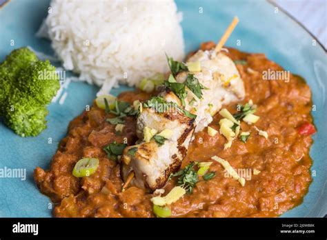 Indian chicken curry with rice Stock Photo - Alamy