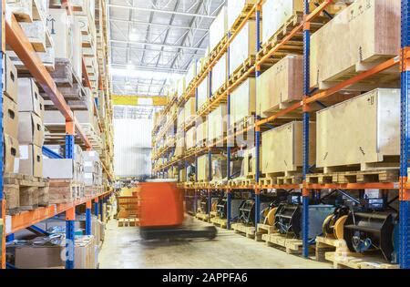 Interior Of A Modern Warehouse With Forklifts Pallet Stacker Truck