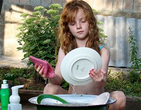 Woman Washing Dishes