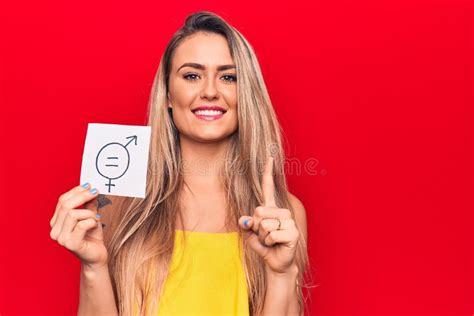 Young Blonde Woman Asking For Sex Discrimination Holding Paper With