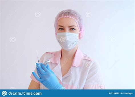 Female Doctor Holding Syringe And Covid 19 Vaccine Healthcare And