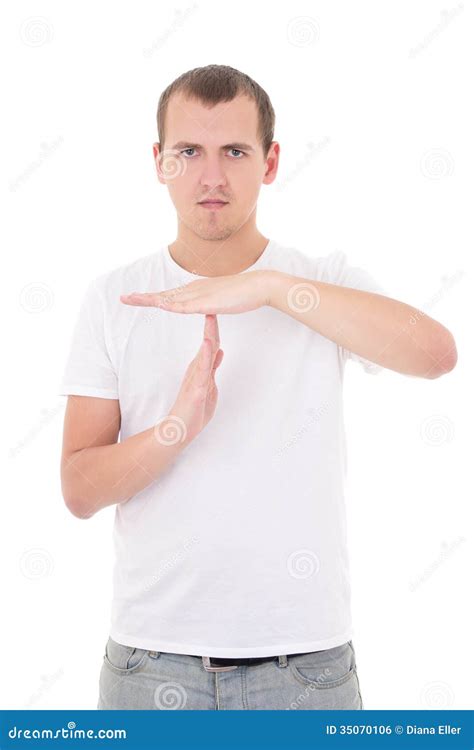 Portrait Of Young Man Gesturing Time Out Sign Isolated On White Stock