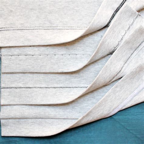 four pieces of cloth folded on top of each other