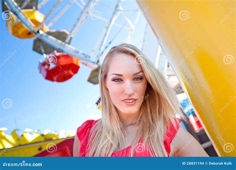 Young Pretty Woman In Front Of A Ferris Wheel Stock Photo Image Of