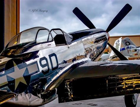 An Old Fashioned Airplane Is Parked On The Tarmac