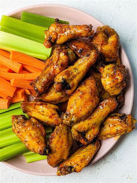 Chicken Wings Celery And Carrots On A Plate