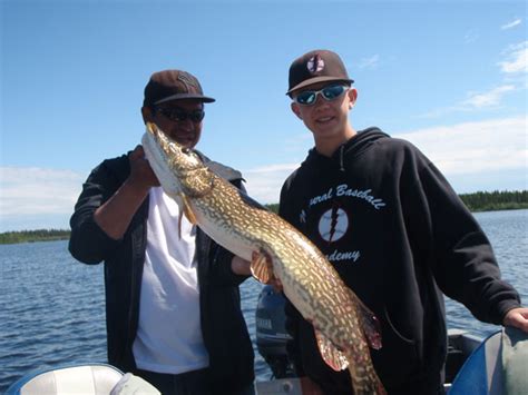 Ket And Mike With A Stocky 40 Inch Pike Gods Lake Elk Island Lodge