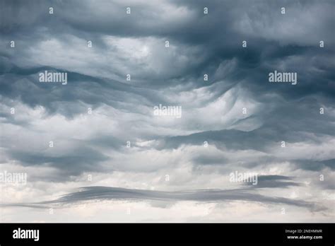 Dramatic Breathtaking Heavy Rain Undulatus Asperatus Clouds With Dark