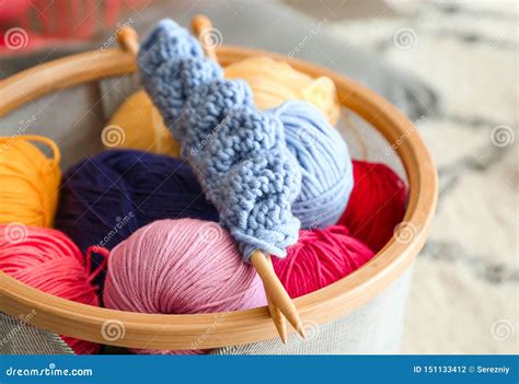 Colorful Knitting Yarn With Needles In Basket Closeup Stock Photo